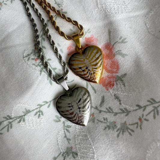 Show Me Yours Ribcage Locket necklace