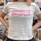 Dream Girl baby tee (Hits Different)